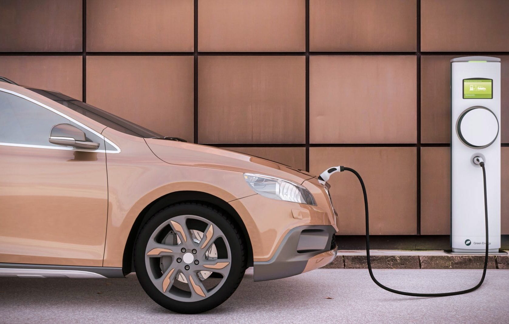 Aufladen eines Elektroautos SUV auf einem Parkplatz mit Ladesäule in urbaner Umgebung