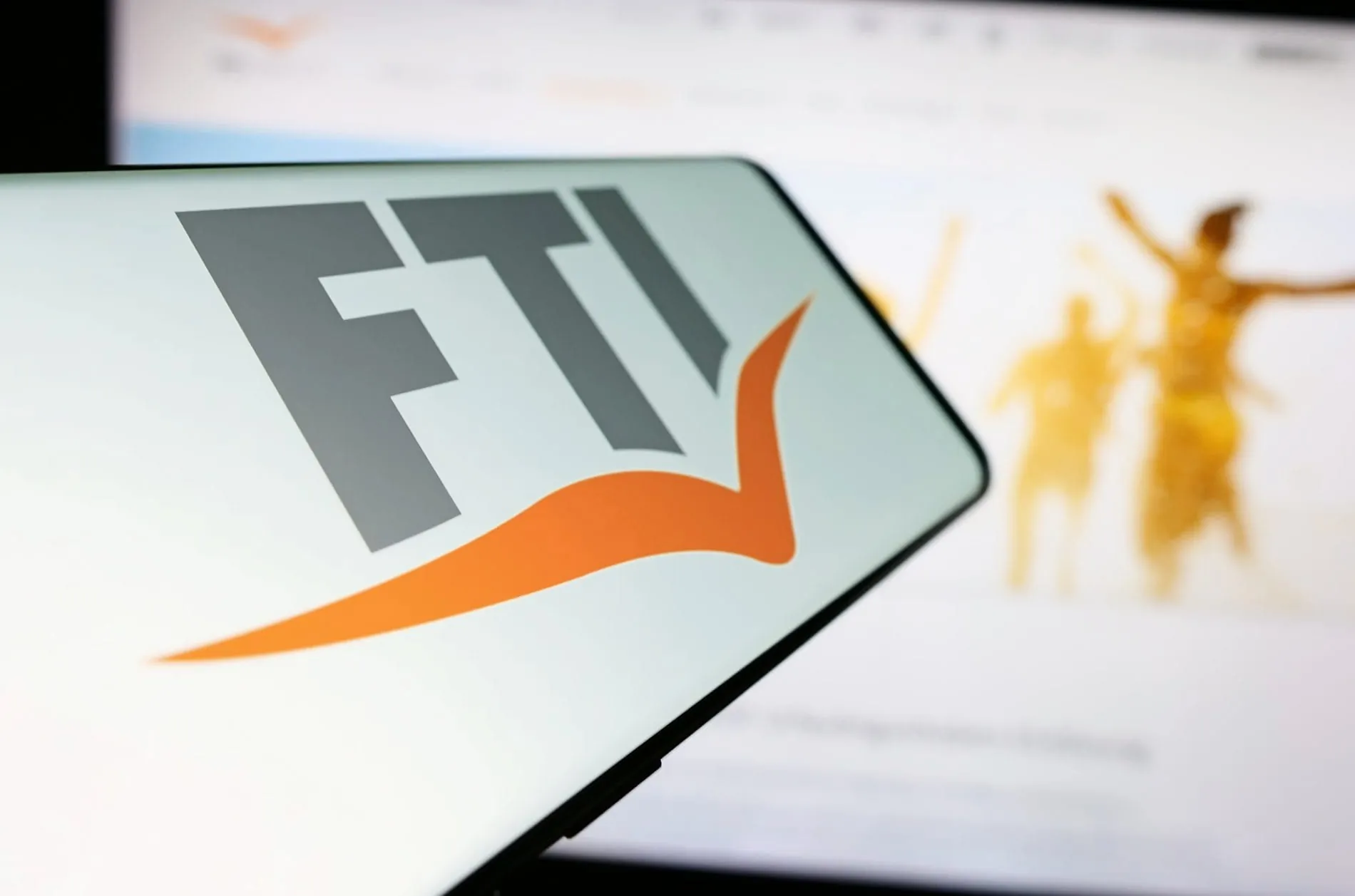 Handy mit dem Logo von FTI