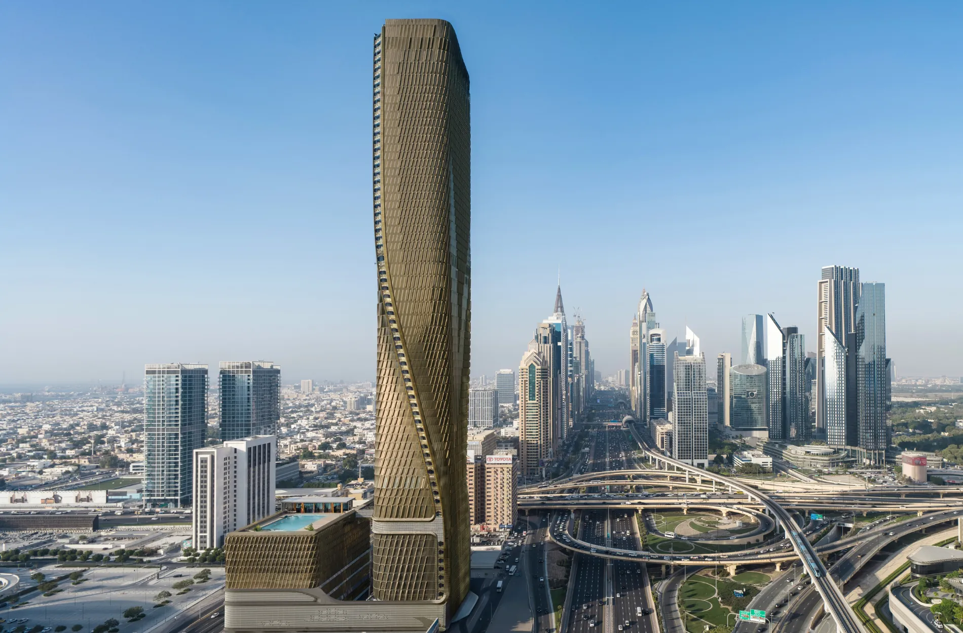 Umrahmt von der höchsten Keramikfassade der Region: Das Mandarin Oriental Downtown im Wasl Tower in Dubai. Die markante, gewundene Form des Turms wird durch innovative Lamellen betont, die den Luftstrom für eine natürliche Kühlung optimieren.