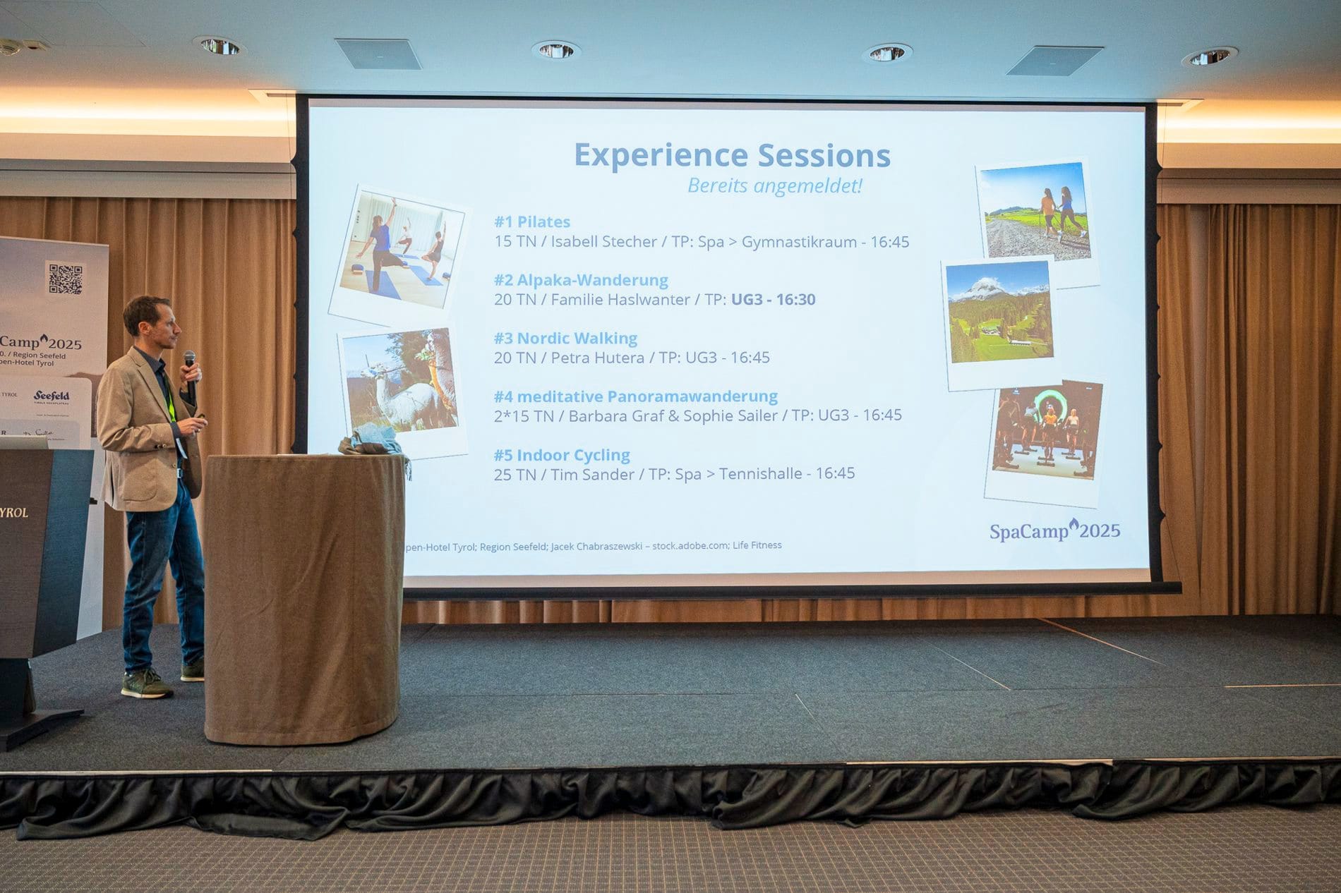 Impressionen vom SpaCamp 2025: Wolfgang Falkner bei der Vorstellung der Experience-Sessions. Auf dem Programm: Pilates, Indoor Cycling, Nordic-Walking, eine meditativen Panorama- und eine Alpaka-Wanderung.