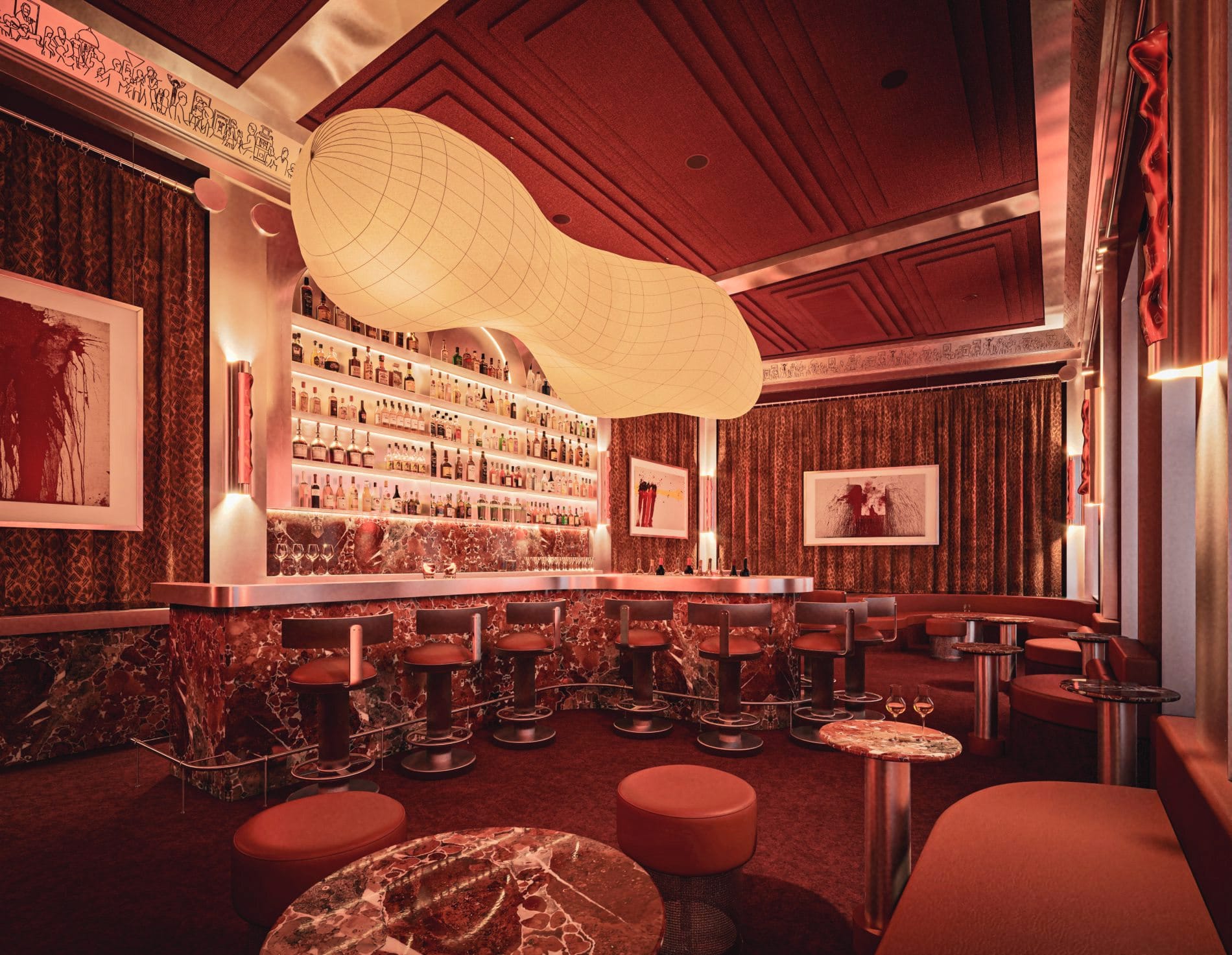 Gedimmtes Licht, rotet Marmor und Samtoberflächen dominieren die Bar "Calypso".