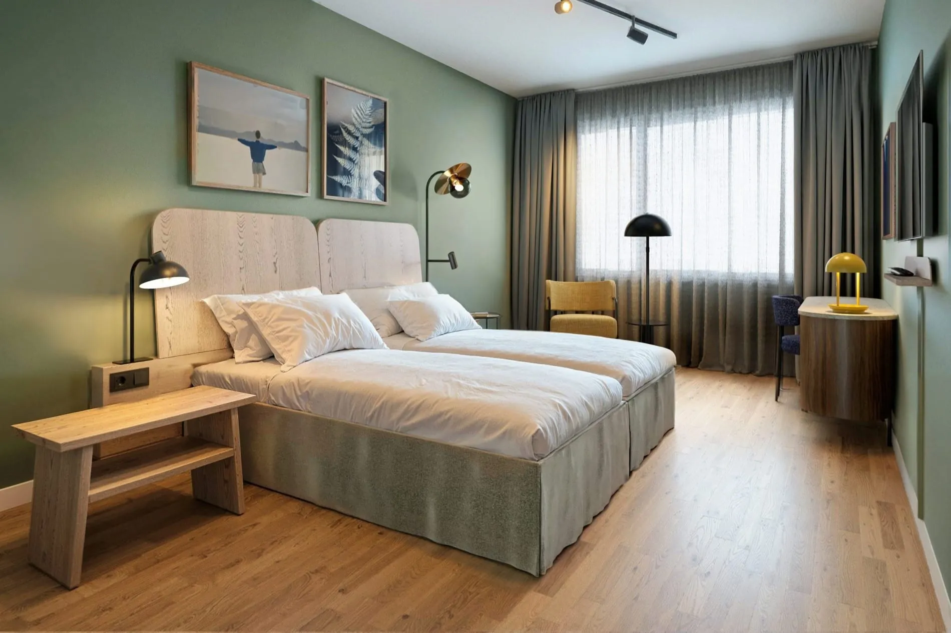 Die 214 Zimmer setzen auf nachhaltige Materialien, klare Linien und beruhigende Grüntöne.