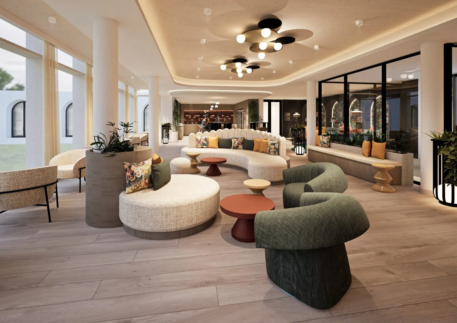 Geschwungene Sitzlandschaften und natürliche Materialien schaffen in der Lobby einen einladenden Treffpunkt, der die ruhige, warme Farbwelt des Resorts widerspiegelt.