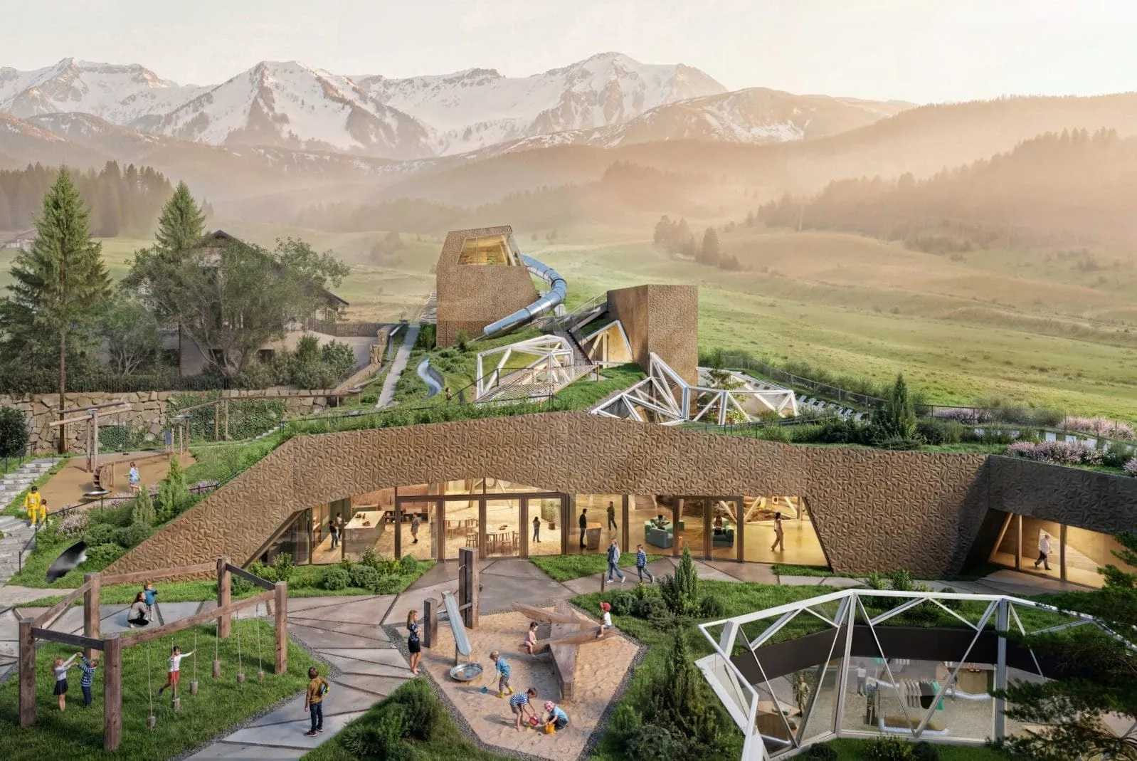 Der neue Erlebnisbereich fügt sich mit begrüntem Dach und unterirdischer Bauweise harmonisch in die Tiroler Berglandschaft ein.
